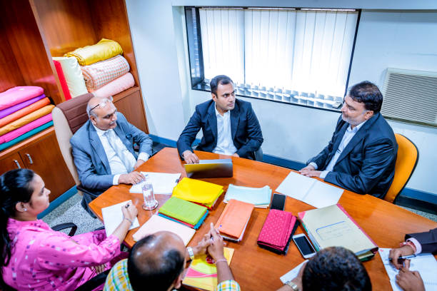 Corporate, Business, Office - Group of Business Executives attending a Meeting. Corporate, Business, Office - Group of Business Executives attending a Meeting.