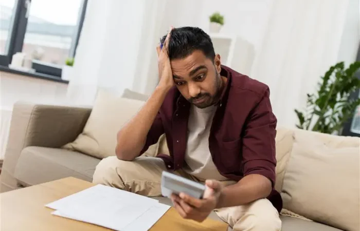 Business Accounting Finances People Concept Confused Man With Papers Calculator Home